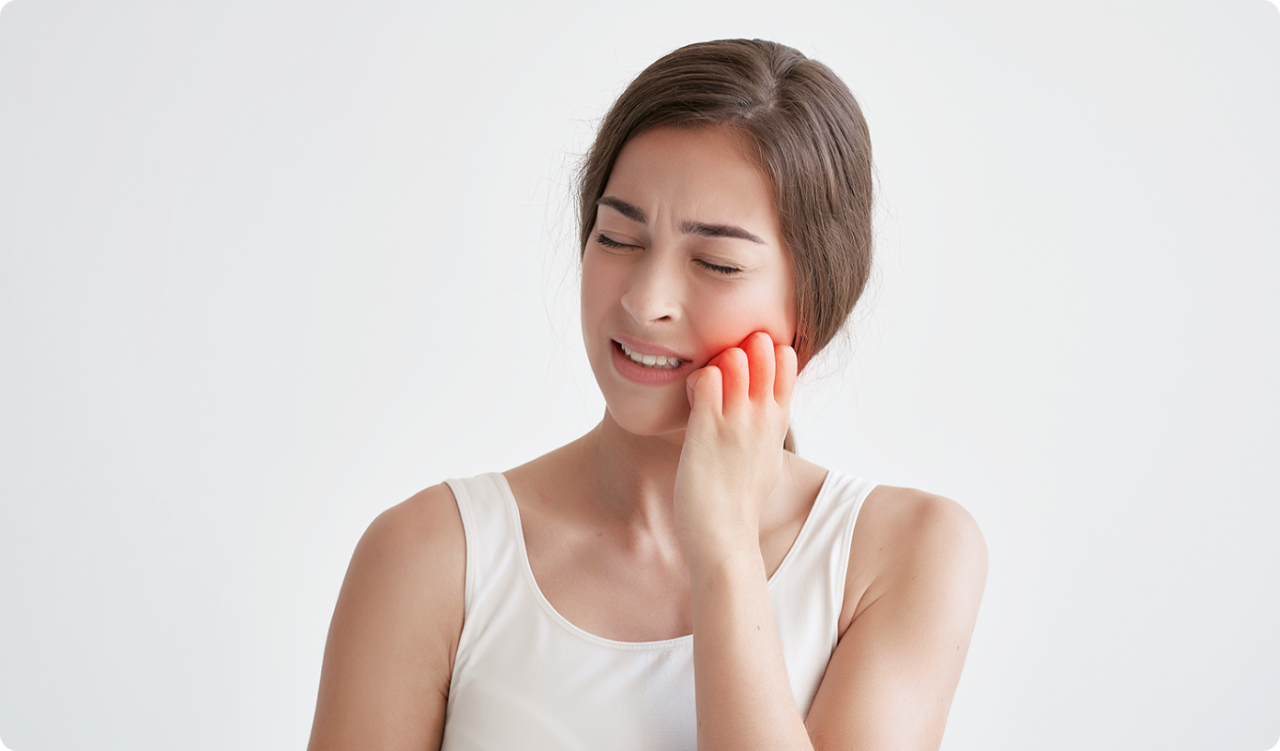Các triệu chứng thường gặp khi răng số 8 bị mắc kẹt?
