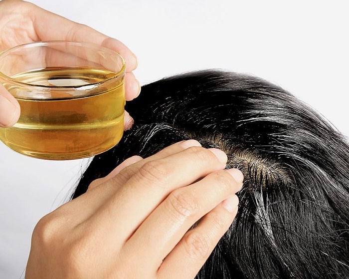 chăm sóc tóc sau sinh với dầu dừa